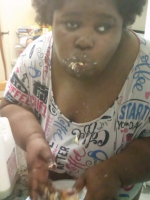 Fat black slut stuffing herself with sweets and milk ?? cover image